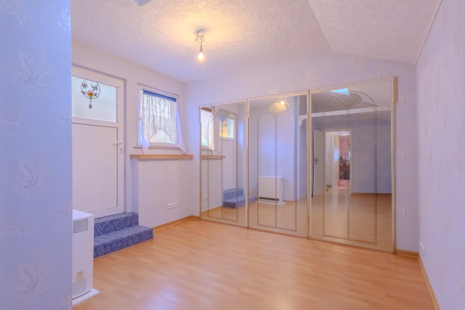 Schlafzimmer 1.OG Mehrfamilienhaus Ispringen