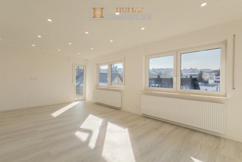 Wohnzimmer - EG Einfamilienhaus Eisingen